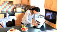 stock-footage-overwhelmed-woman-working-and-cooking-in-the-kitchen-at-home